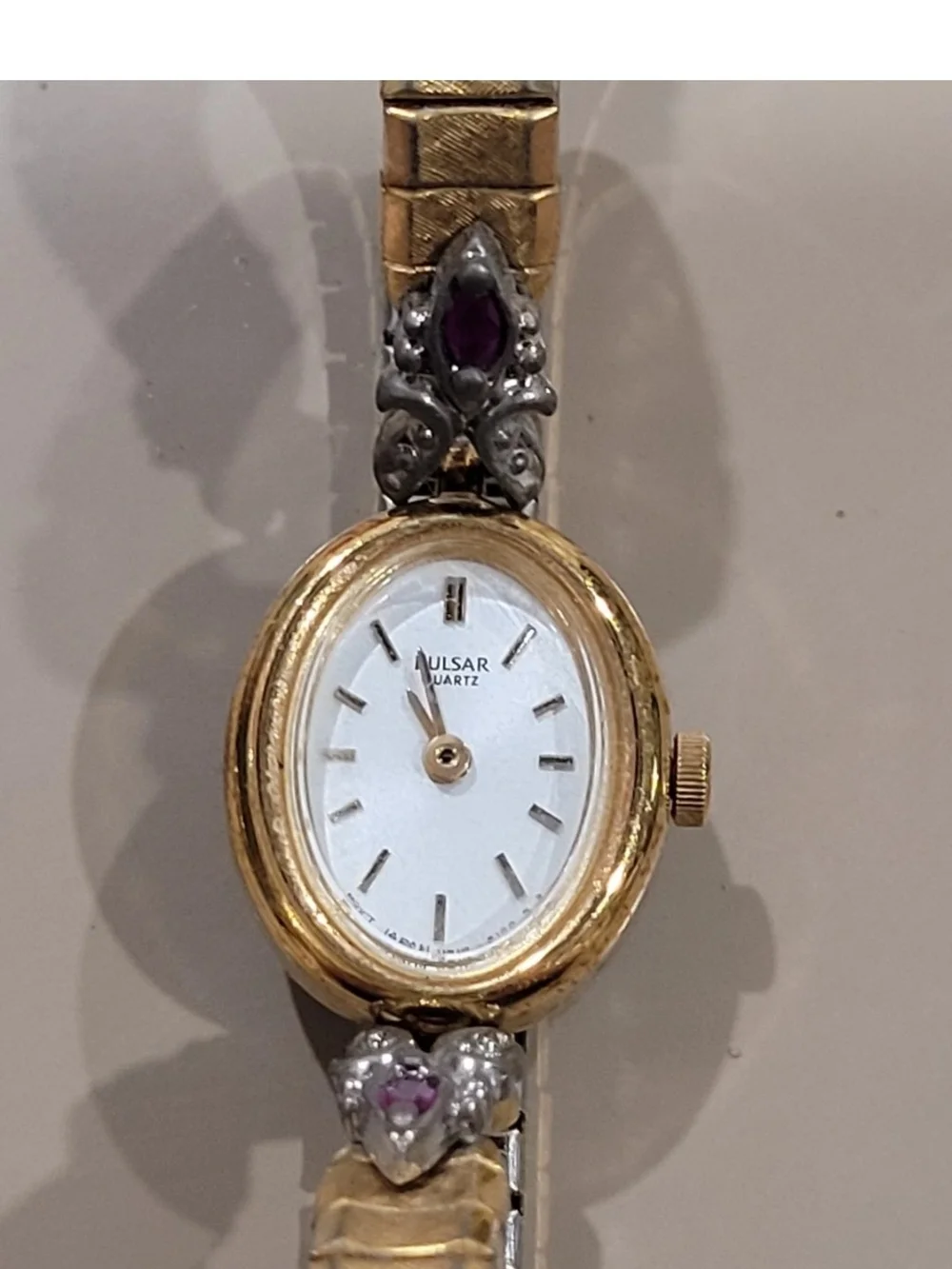 Vintage Pulsar Gold Tone Women's Watch with Purple Gem Accents